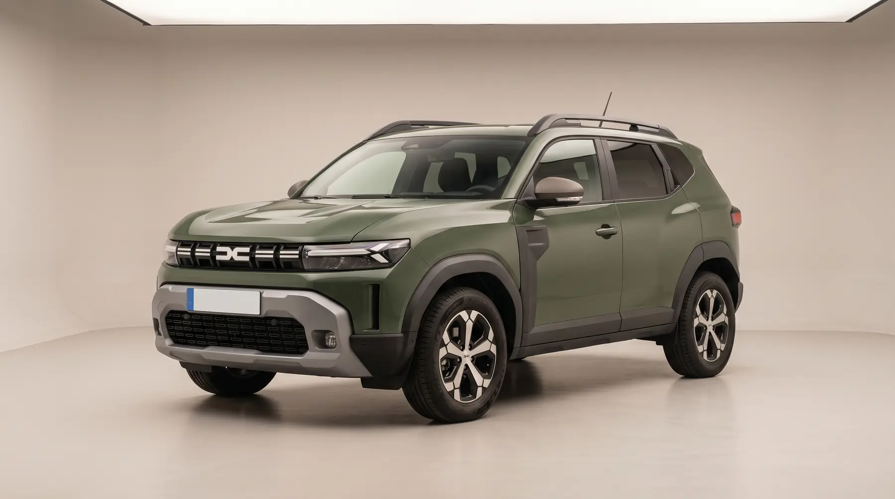 A green compact SUV in a studio